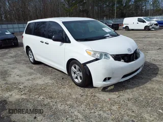2015 Toyota Sienna L with VIN 5TDZK3DC7FS575547, listed as a IAAI auction lot 41611652 with 355,784 mi miles. Bid and sale history available at carsss.com. Image 1.