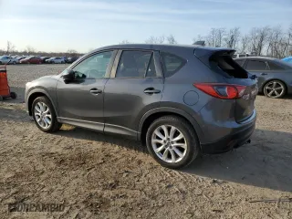 2014 Mazda CX-5 Grand Touring with VIN JM3KE4DY5E0372787, listed as a Copart auction lot 48873675 with 136,784 mi miles and Salvage Title. Bid and sale history available at carsss.com. Image 2.