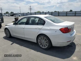 2013 BMW 3 Series 328i xDrive with VIN WBA3B3C53DF537817, listed as a Copart auction lot 60512215 with Not provided miles and Salvage title. Bid and sale history available at DreamBid. Image 2.