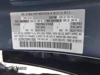 2024 Mazda 3 S Carbon Edition with VIN 3MZBPBCM3RM416565, listed as a IAAI auction lot 42047841 with 11,074 mi miles and . Bid and sale history available at DreamBid. Image 9.