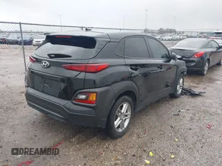 2018 Hyundai Kona SE with VIN KM8K12AA7JU128279, listed as a IAAI auction lot 41456296 with 100,977 mi miles and . Bid and sale history available at DreamBid. Image 4.
