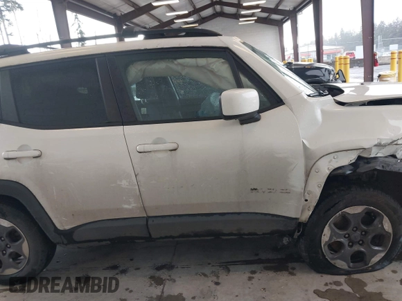 2015 Jeep Renegade Latitude with VIN ZACCJBBH7FPB51994, listed as a IAAI auction lot 41658051 with 95,580 mi miles. Bid and sale history available at carsss.com. Image 14.
