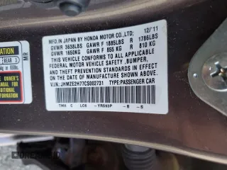 2012 Honda Insight EX z VIN JHMZE2H77CS002731, wystawiony jako Copart lot #47240475 z przebiegiem 139 627 mil mil oraz Szkoda całkowita • Salvage title. Historia ofert i sprzedaży dostępna na DreamBid. Obrazek 12.