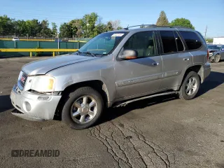 2004 GMC Envoy SLT with VIN 1GKDT13S342196882, listed as a Copart auction lot 60323755 with 277,726 mi miles and Salvage title. Bid and sale history available at DreamBid. Image 1.