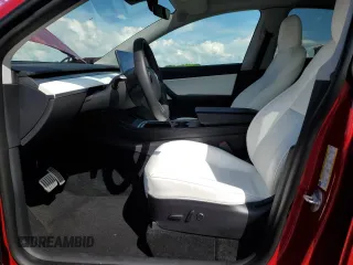 2022 Tesla Model Y Performance with VIN 7SAYGDEF6NF337996, listed as a Copart auction lot 56039515 with 16,468 mi miles and Salvage title. Bid and sale history available at DreamBid. Image 14.