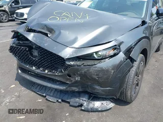 2024 Mazda CX-30 Premium Plus with VIN 3MVDMBEY1RM720111, listed as a IAAI auction lot 42730412 with 3,988 mi miles and . Bid and sale history available at DreamBid. Image 6.