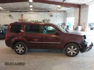 2012 Honda Pilot Touring z VIN 5FNYF4H91CB033638, wystawiony jako IAAI lot #42376592 z przebiegiem 217 984 mil mil oraz . Historia ofert i sprzedaży dostępna na DreamBid. Obrazek 13.