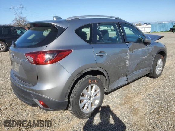 2014 Mazda CX-5 Sport with VIN JM3KE2BE1E0350718, listed as a Copart auction lot 46370205 with 98,065 mi miles and Salvage title. Bid and sale history available at DreamBid. Image 3.