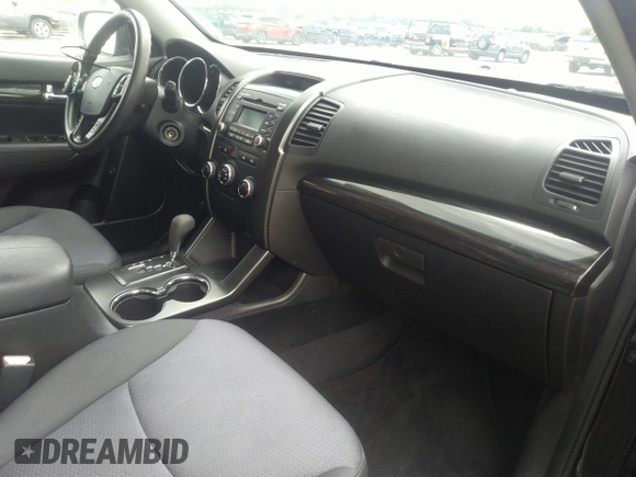 2012 Kia Sorento LX with VIN 5XYKTCA61CG272964, listed as a IAAI auction lot 42210384 with 181,948 mi miles and . Bid and sale history available at DreamBid. Image 5.
