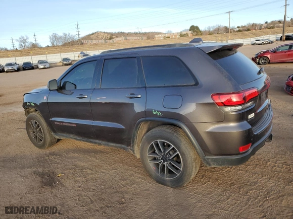 2019 Jeep Grand Cherokee Trailhawk with VIN 1C4RJFLG8KC689402, listed as a Copart auction lot 41438465 with 56,477 mi miles and Salvage Title. Bid and sale history available at carsss.com. Image 2.