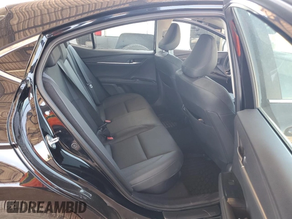 2025 Toyota Camry LE z VIN 4T1DAACK5SU592617, wystawiony jako Copart lot #56370875 z przebiegiem 1 615 mil mil oraz Szkoda całkowita • Salvage title. Historia ofert i sprzedaży dostępna na DreamBid. Obrazek 10.