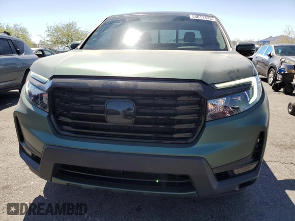 2022 Honda Ridgeline RTL-E with VIN 5FPYK3F73NB014672, listed as a Copart auction lot 54617475 with 76,160 mi miles and Salvage title. Bid and sale history available at DreamBid. Image 5.