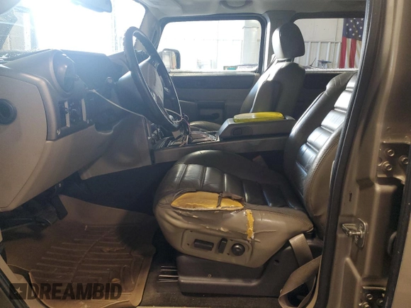 2003 Hummer H2 with VIN 5GRGN23U53H101713, listed as a Copart auction lot 85216034 with 189,549 mi miles and Non Repairable. Bid and sale history available at carsss.com. Image 7.