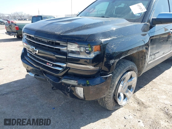 2016 Chevrolet Silverado 1500 LTZ with VIN 3GCUKSEC4GG318090, listed as a IAAI auction lot 41572873 with 82,008 mi miles and . Bid and sale history available at DreamBid. Image 6.