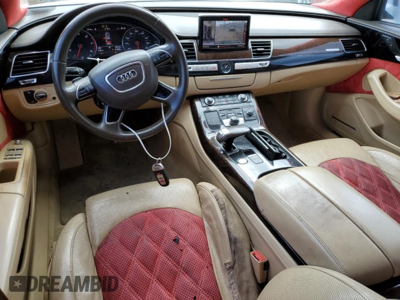 2014 Audi A8 3.0T z VIN WAURGAFD6EN004841, wystawiony jako Copart lot #51474005 z przebiegiem 214 588 mil mil oraz Szkoda całkowita • Salvage title. Historia ofert i sprzedaży dostępna na DreamBid. Obrazek 8.