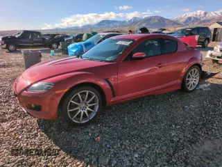 2004 Mazda RX-8 with VIN JM1FE173040121702, listed as a Copart auction lot 87037064 with 51,964 mi miles and Salvage Title. Bid and sale history available at carsss.com. Image 1.
