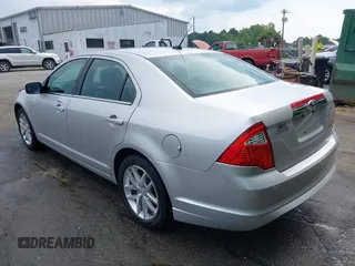 2012 Ford Fusion SEL with VIN 3FAHP0JAXCR359565, listed as a IAAI auction lot 42609189 with 211,017 mi miles and . Bid and sale history available at DreamBid. Image 3.