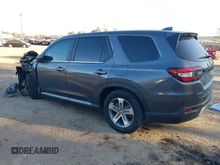 2023 Honda Pilot EX-L with VIN 5FNYG1H5XPB044829, listed as a IAAI auction lot 41396208 with 15,277 mi miles and . Bid and sale history available at DreamBid. Image 3.