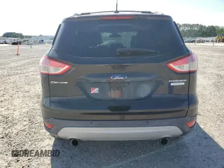 2013 Ford Escape Titanium z VIN 1FMCU0J93DUB60916, wystawiony jako Copart lot #61692595 z przebiegiem 169 691 mil mil oraz Szkoda całkowita • Salvage title. Historia ofert i sprzedaży dostępna na DreamBid. Obrazek 6.