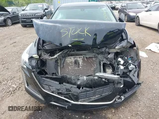 2014 Cadillac CTS AWD z VIN 1G6AW5SX6E0175566, wystawiony jako IAAI lot #42350632 z przebiegiem 41 610 mil mil oraz . Historia ofert i sprzedaży dostępna na DreamBid. Obrazek 6.