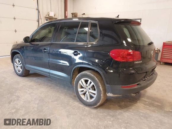 2014 Volkswagen Tiguan SE z VIN WVGAV3AX9EW614094, wystawiony jako IAAI lot #42350601 z przebiegiem 128 996 mil mil oraz . Historia ofert i sprzedaży dostępna na DreamBid. Obrazek 3.