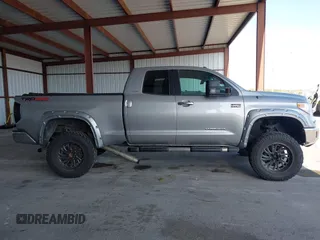 2015 Toyota Tundra Limited with VIN 5TFBW5F14FX424723, listed as a IAAI auction lot 42129929 with 222,060 mi miles and . Bid and sale history available at DreamBid. Image 13.
