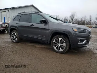 2022 Jeep Cherokee Limited with VIN 1C4PJMDX4ND548898, listed as a Copart auction lot 49797095 with 12,338 mi miles and Clean Title. Bid and sale history available at DreamBid. Image 4.