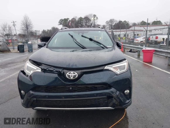 2017 Toyota RAV4 SE with VIN 2T3NFREV3HW372775, listed as a IAAI auction lot 41571705 with 119,015 mi miles and . Bid and sale history available at DreamBid. Image 11.