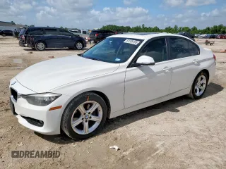2014 BMW 3 Series 320i with VIN WBA3B1C53EP678693, listed as a Copart auction lot 61289165 with 110,428 mi miles and Salvage title. Bid and sale history available at DreamBid. Image 1.