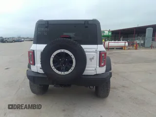 2023 Ford Bronco z VIN 1FMEE5DP9PLB30696, wystawiony jako IAAI lot #41468543 z przebiegiem 12 465 mil mil oraz . Historia ofert i sprzedaży dostępna na DreamBid. Obrazek 16.