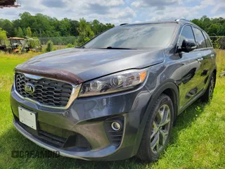 2019 Kia Sorento EX with VIN 5XYPHDA53KG604681, listed as a IAAI auction lot 42208681 with 81,110 mi miles and . Bid and sale history available at carsss.com. Image 2.