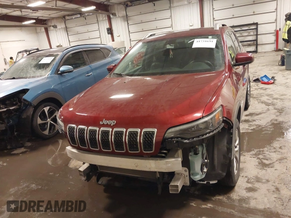 2019 Jeep Cherokee Latitude Plus with VIN 1C4PJMLB2KD198561, listed as a IAAI auction lot 41731691 with 71,129 mi miles. Bid and sale history available at carsss.com. Image 6.