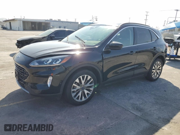 2021 Ford Escape Titanium with VIN 1FMCU9J93MUA54213, listed as a Copart auction lot 59211045 with Not provided miles and Salvage title. Bid and sale history available at DreamBid. Image 1.