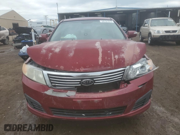 2009 Kia Optima LX z VIN KNAGE228395313765, wystawiony jako Copart lot #59707675 z przebiegiem 170 773 mil mil oraz Szkoda całkowita • Salvage title. Historia ofert i sprzedaży dostępna na DreamBid. Obrazek 5.
