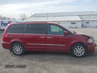 2014 Chrysler Town & Country Touring with VIN 2C4RC1BG9ER418147, listed as a IAAI auction lot 41812594 with 161,356 mi miles and . Bid and sale history available at DreamBid. Image 13.