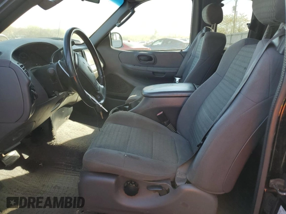 2002 Ford F-150 XL with VIN 1FTRX17L42NB06983, listed as a Copart auction lot 54172855 with 150,243 mi miles and Salvage title. Bid and sale history available at DreamBid. Image 7.
