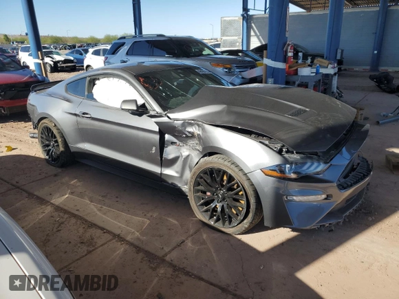 2021 Ford Mustang GT z VIN 1FA6P8CF9M5103856, wystawiony jako Copart lot #49406715 z przebiegiem 27 499 mil mil oraz Szkody całkowita. Historia ofert i sprzedaży dostępna na DreamBid. Obrazek 4.