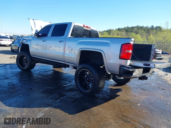2015 GMC Sierra 2500HD available WiFi Denali with VIN 1GT120E87FF173940, listed as a IAAI auction lot 41843586 with 167,992 mi miles. Bid and sale history available at carsss.com. Image 3.