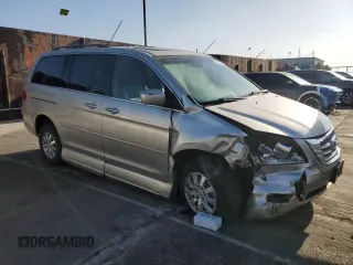2009 Honda Odyssey EX-L with VIN 5FNRL38619B044063, listed as a Copart auction lot 52372505 with 204,658 mi miles and Salvage Title. Bid and sale history available at DreamBid. Image 4.