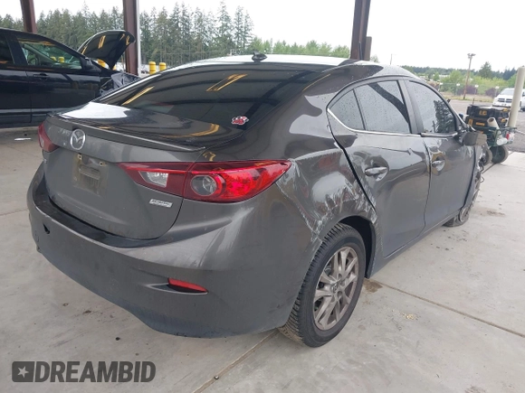 2015 Mazda 3 i Grand Touring with VIN JM1BM1W74F1264770, listed as a IAAI auction lot 42290722 with 161,617 mi miles and . Bid and sale history available at DreamBid. Image 4.