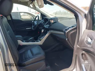 2013 Ford Escape SEL z VIN 1FMCU9H95DUC87631, wystawiony jako IAAI lot #42564756 z przebiegiem 144 467 mil mil oraz . Historia ofert i sprzedaży dostępna na DreamBid. Obrazek 5.