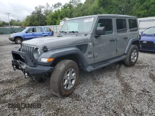 2020 Jeep Wrangler Unlimited Freedom with VIN 1C4HJXDG0LW285901, listed as a Copart auction lot 52193555 with 63,823 mi miles and Salvage title. Bid and sale history available at DreamBid. Image 1.