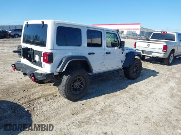2022 Jeep Wrangler Unlimited Rubicon z VIN 1C4JJXFGXNW121489, wystawiony jako IAAI lot #41749550 z przebiegiem 56 601 mil mil oraz . Historia ofert i sprzedaży dostępna na DreamBid. Obrazek 4.