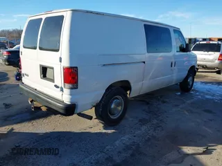 2003 Ford Econoline Cargo Commercial with VIN 1FTNE24L23HA66109, listed as a IAAI auction lot 41218259 with 240,390 mi miles and . Bid and sale history available at carsss.com. Image 4.
