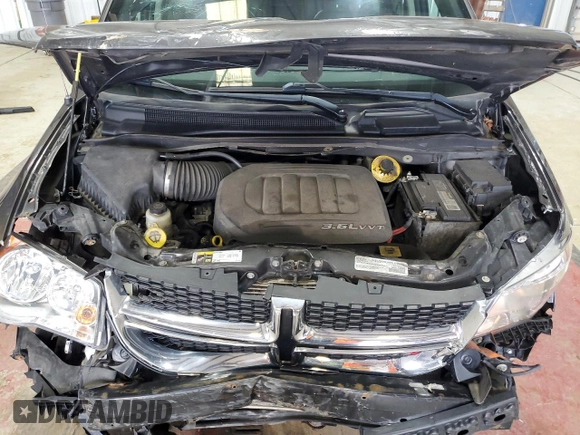 2018 Dodge Grand Caravan SXT z VIN 2C4RDGCG0JR297436, wystawiony jako Copart lot #60523225 z przebiegiem 101 292 mil mil oraz Szkoda całkowita • Salvage title. Historia ofert i sprzedaży dostępna na DreamBid. Obrazek 12.