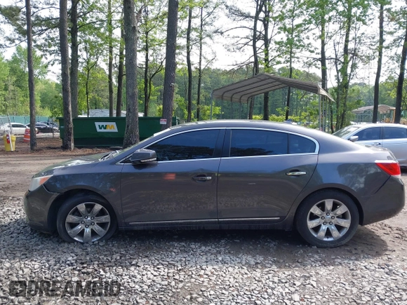 2012 Buick LaCrosse Premium 3 z VIN 1G4GH5E31CF310937, wystawiony jako IAAI lot #42092530 z przebiegiem 165 295 mil mil oraz . Historia ofert i sprzedaży dostępna na DreamBid. Obrazek 14.
