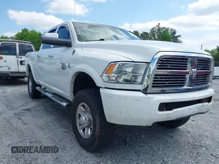 2012 Ram 2500 Laramie Longhorn with VIN 3C6UD5GL1CG121386, listed as a IAAI auction lot 42119700 with 207,173 mi miles and . Bid and sale history available at DreamBid. Image 1.