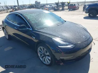 2020 Tesla Model 3 Standard Range Plus with VIN 5YJ3E1EAXLF614002, listed as a IAAI auction lot 41758898 with 42,363 mi miles. Bid and sale history available at carsss.com. Image 1.