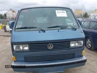 1989 Volkswagen Vanagon with VIN WV2YB0252KH059286, listed as a IAAI auction lot 42137080 with 130,604 mi miles and . Bid and sale history available at DreamBid. Image 6.