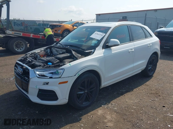 2017 Audi Q3 Premium z VIN WA1ECCFS7HR009402, wystawiony jako IAAI lot #42462248 z przebiegiem 46 536 mil mil oraz . Historia ofert i sprzedaży dostępna na DreamBid. Obrazek 17.
